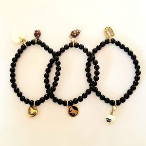 3 Juicy Couture stretch bracelets